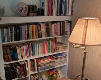 Lots of books and lamps