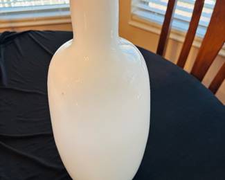 Someone with lipstick has been drinking from the vase.
