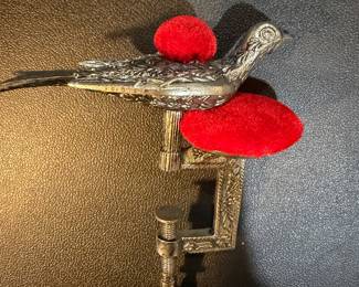 We have two Vintage Brass Victorian Bird Sewing clamps