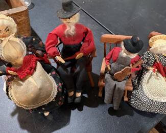 Vintage folk art walnut head dolls