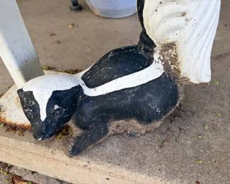 1950s cement skunk