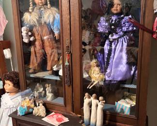 Antique display cabinet filled with Porcelain dolls & Show Shoppers Inc. Doll 26" Montana