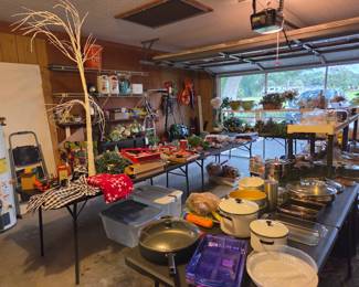 Garage is loaded with yard tools, Christmas and overflow from kitchen
