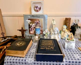 Large used bibles and religious paraphernalia