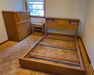 Solid wood build with classic mid-century dovetail joints. Sturdy and drawers glide well, but needs a full sand/refinish or heavy cleaning to bring back the original blonde luster. Perfect DIY project piece! Large dresser: 55.5x64(with mirror)x19 Tall dresser: 40x47x18.5 Night stand (x1): 21x24x15 Headboard: 58x37x9 Full-size bookcase headboard with wooden side rails and footboard