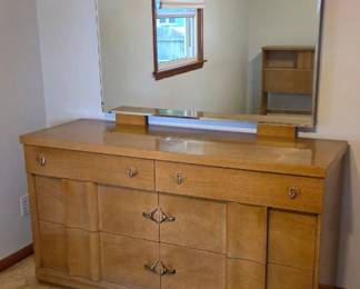 Solid wood build with classic mid-century dovetail joints. Sturdy and drawers glide well, but needs a full sand/refinish or heavy cleaning to bring back the original blonde luster. Perfect DIY project piece! Large dresser: 55.5x64(with mirror)x19 Tall dresser: 40x47x18.5 Night stand (x1): 21x24x15 Headboard: 58x37x9 Full-size bookcase headboard with wooden side rails and footboard