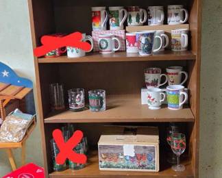 Holiday mugs and wine glasses; shelf unit also available