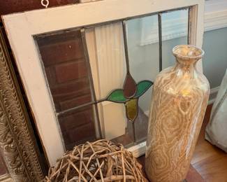 Stained glass window, wicker balls, vases