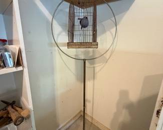 Vintage metal bird cage and stand