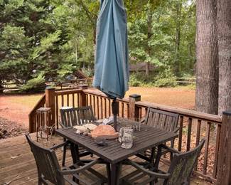 Outdoor table, chairs and umbrella