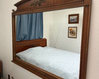 Vintage wood mirror with ornate guilt ribbon details
