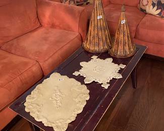 Coffee table and wall pockets and plaques