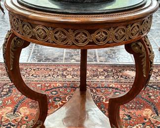 Beautiful Louis XV style gueridon or center table with marble top and ormolu mounts, 20th century.