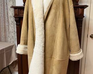 Calvin Klein ladies shearling full length coat.