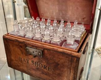 English Victorian apothecary box with medicine bottles, mid-to late 19th century.