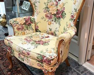 French style wingback armchair with custom upholstery.