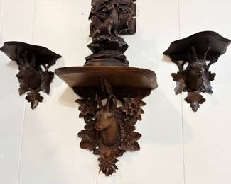 Fantastic collection of Black Forest carved wood wall shelfs and sculptures.