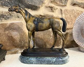 Bronze sculpture of saddled horse after French sculptor Jules Moigniez (1835-1894), 20th century.
