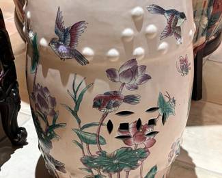 Vintage Chinese ceramic garden seat with bird and floral decoration.