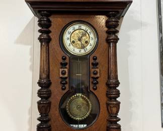 Late 19th century Austrian or German wall clock in excellent working condition.