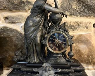Antique French spelter mantel clock with classically draped maiden, in good working condition.