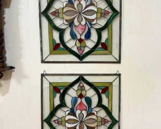 Pair of vintage stained glass windows.