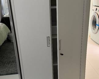 white metal utility storage cabinet 