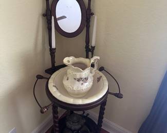 Antique wash basin stand with mirror, handles,and the pitcher and bowl