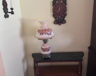 Hurricane parlor lamp and wooden hand carved clock