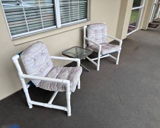 PVC chairs and a small table