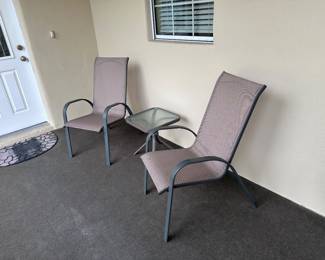 Outdoor chairs and a small table
