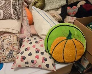 An assortment of pillows and decor