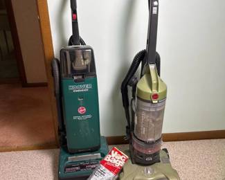 184 twovintagehooveruprightvacuums
