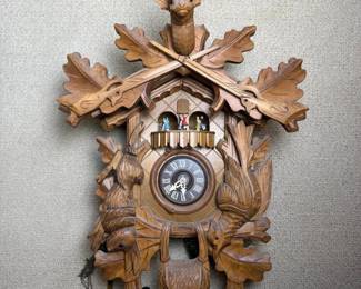 005 carvedwoodgermancuckooclockwithani