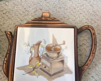 Orient TeapotShaped Ceramic Trivet with Coffee Grinder and Pitcher Illustration
