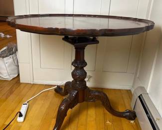 171 roundcarvedpedestaltableinthemanne