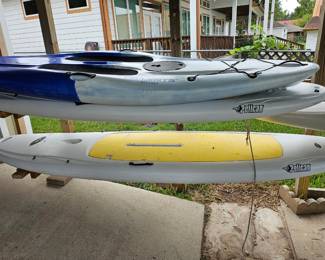 Paddle boards and a kayak