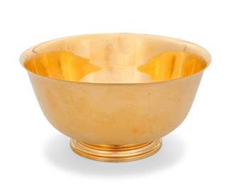 28 A Tiffany & Co. silver gilt footed bowl 20th century Marked: TIFFANY & CO MAKERS STERLING 23618 Height 4 1/4 in., diameter 8 1/2 in. 18.4 oz. troy approximately Estimate: $600 - $800