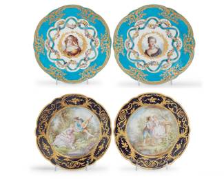 173 A group of four Sèvres style porcelain cabinet plates Late 19th/early 20th century Comprising a pair of portrait plates and a pair decorated with figures in 18th century attire Blue painted interlaced Ls marks, some enclosing letters; portraits marked for subject 4 pieces Diameter of portrait plates 9 7/8 in.; diameter of cobalt pair 9 3/4 in. Estimate: $600 - $800