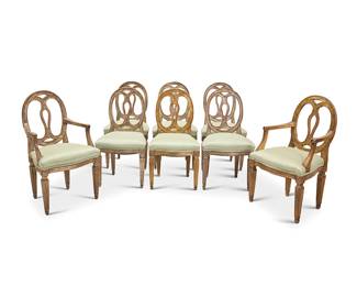 141 An assembled set of eight Italian Neoclassical silvered dining chairs One circa 1780, five early 20th century, two late 20th century Comprising a pair of armchairs and six side chairs, each with later upholstered seat cushion 8 pieces Height of each armchair 38 1/2 in., width 21 1/2 in., depth 21 3/4 in.; height of each side chair 37 1/4 in., width 19 3/4 in., depth 19 in. Estimate: $3,000 - $5,000