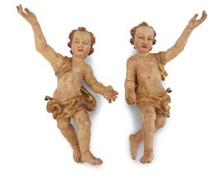 95 Two German Baroque parcel gilt carved wood putti 18th century Depicted in near-mirrored poses 2 pieces Heights 14-16 in., widths 9-10 in., depths 5 1/2-6 1/4 in. Estimate: $500 - $700