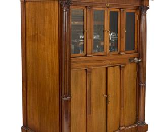 266 A Mills Novelty Co. Violano-Virtuoso music player Circa 1915 The five-cent player with violin and piano accompaniment, housed in a restored mahogany case with four glass panels, the hinged doors flanked by fluted Corinthian column accents Serial number: 2589; violin fingerboard bearing patent dates and burn marked: 2305 Height 64 3/4 in., width 49 1/4 in., depth 33 in. Estimate: $7,000 - $10,000