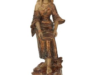 251 A Bernhard Bloch polychrome terracotta figure of a woman Late 19th/early 20th century The Tambourine Player, with snake anklet Impressed to underside: 2 / BB / 7450 Height 14 in., width 5 1/2 in., depth 4 3/4 in. Estimate: $600 - $800