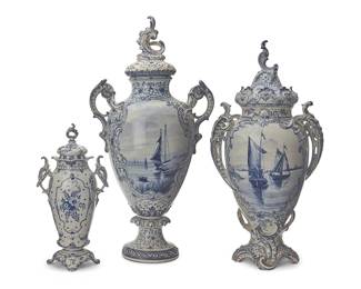 84 Three Royal Bonn earthenware 'Delft' covered urns Mid/late 19th century The handled and lidded urns, each depicting sailboats to one side and floral motifs to the other Each marked: Royal Bonn / "Delft"; each impressed: Franz Ant. [Anton] Mehlem / Bonn A/Rhein; each with various impressed and painted numbers 3 pieces Height of tallest 30 1/4 in., width 15 1/2 in., depth 10 3/4 in.; height of shortest 17 in., width 8 1/2 in., depth 6 1/2 in. Estimate: $500 - $700