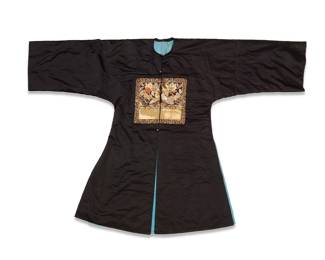 49 A Chinese Civil rank robe with embroidered rank badges Late Qing dynasty, circa 1910 The slightly padded black silk button-front robe with attached 'Silver Pheasant' rank badges front and back, each worked in vibrant multicolored and metal thread embroidery and beadwork featuring a central pheasant bird appliqué motif amid other auspicious motifs including stylized bats, peaches, and foliage, with waves and deep water and a floral fretwork motif border, fully lined in blue silk and fastened with corded loops and brass-toned floral buttons Center back height 44 1/4 in., width 22 1/2 in. (at underarms); Sleeve length cuff to collar 29 1/2 in. Estimate: $3,000 - $5,000