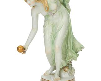 168 A Meissen porcelain figure of a bowler Late 19th/early 20th century After the model by Walter Schott (1861-1938) Underglaze blue crossed swords with double cancellation; incised: Q 180; impressed: 51 Height 11 1/2 in., width 8 in., depth 4 3/4 in. Estimate: $800 - $1,200