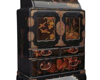 207 A Japanese gilt and lacquered table cabinet Meiji era (1868-1912) With an upper drawer above locking doors opening to reveal six small inner drawers, above three more larger drawers, raised on shaped bracket feet Height 8 1/2 in., width 12 1/2 in., depth 6 5/8 in. Estimate: $600 - $800