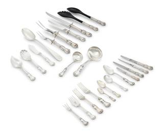 26 An extensive Reed & Barton sterling silver 'Marlborough' flatware service 20th century Designed 1906 Comprising: 16 dinner knives 16 dinner forks 12 luncheon knives 12 luncheon forks 9 butter spreaders 5 steak knives 8 demitasse spoons 29 teaspoons 10 cream soup spoons 13 cake forks 1 salad serving set 1 small ladle 1 cream ladle 1 master butter knife 2 serving spoons 1 pickle fork 1 jelly spoon 1 shell spoon 1 large carving knife and fork 1 small carving knife and fork Each marked: STERLING Reed & Barton Together with an S. Kirk & Son sterling 'Old Maryland Plain' stuffing spoon 145 pieces Total weighable sterling 129.6 oz. troy approximately Estimate: $4,000 - $6,000