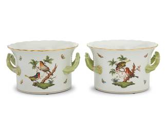 7 A pair of Herend porcelain 'Rothschild Bird' jardinieres 20th century Each flanked by branch handles Blue printed factory marks, shape 7239 over pattern code RO Height 6 1/4 in., width across handles 10 1/2 in., depth 10 1/4 in. Estimate: $600 - $800