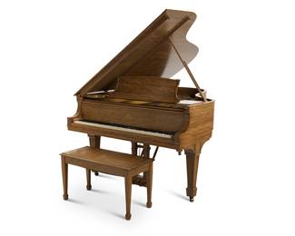 273 A Steinway mahogany model 'A' parlor grand piano 1917, serial number 188605 Inscribed above the keyboard: Steinway & Sons; the harp with serial number The 88-key piano housed in a mahogany case, together with a conforming upholstered bench Height 3 ft. 3 3/4 in., width 4 ft. 10 in., depth 6 ft. 4 in. approximately; height of bench 19 1/4 in., width 34 1/8 in., depth 15 1/4 in. Estimate: $3,000 - $5,000